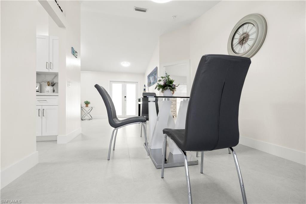 1410 San Marco Road Marco Island, FL 34145 - Photo 13 of 50 a view of a hallway with seating area