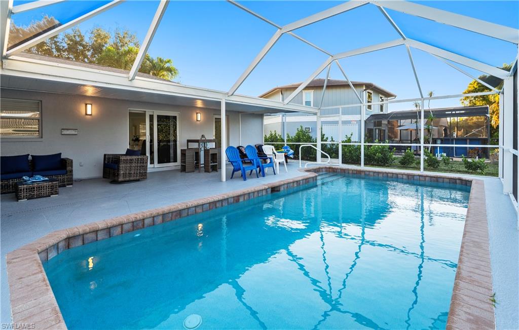 1410 San Marco Road Marco Island, FL 34145 - Photo 36 of 50 a view of a swimming pool with a patio
