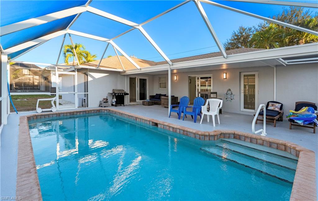 1410 San Marco Road Marco Island, FL 34145 - Photo 38 of 50 a view of a swimming pool with a patio