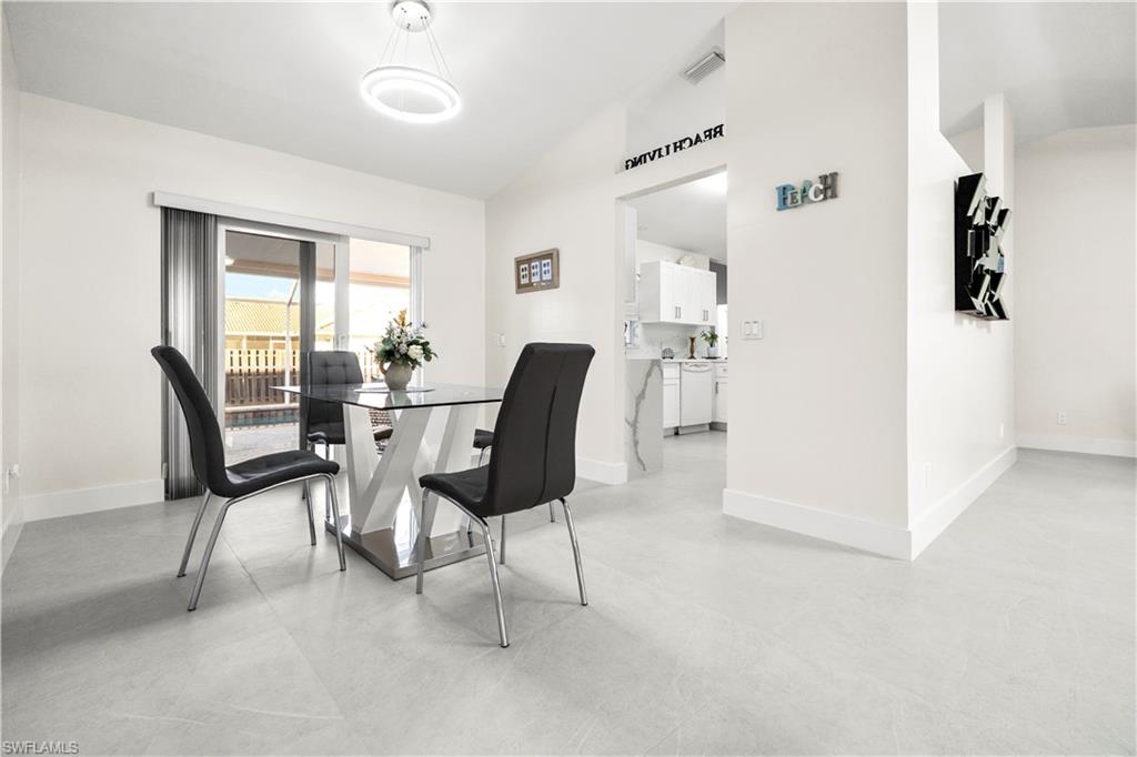 1410 San Marco Road Marco Island, FL 34145 - Photo 49 of 50 a dining room with furniture and window