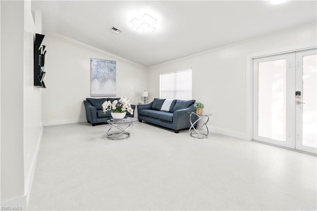 1410 San Marco Road Marco Island, FL 34145 - Photo 7 of 50 a living room with furniture and a wooden floor