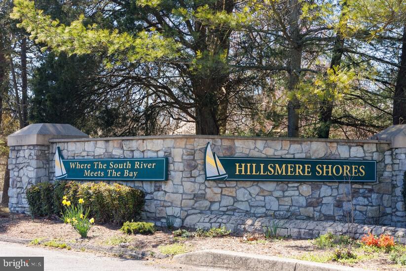 404 Beach Drive Annapolis, MD 21403 - Photo 22 of 25 a view of outdoor space with signage and flags