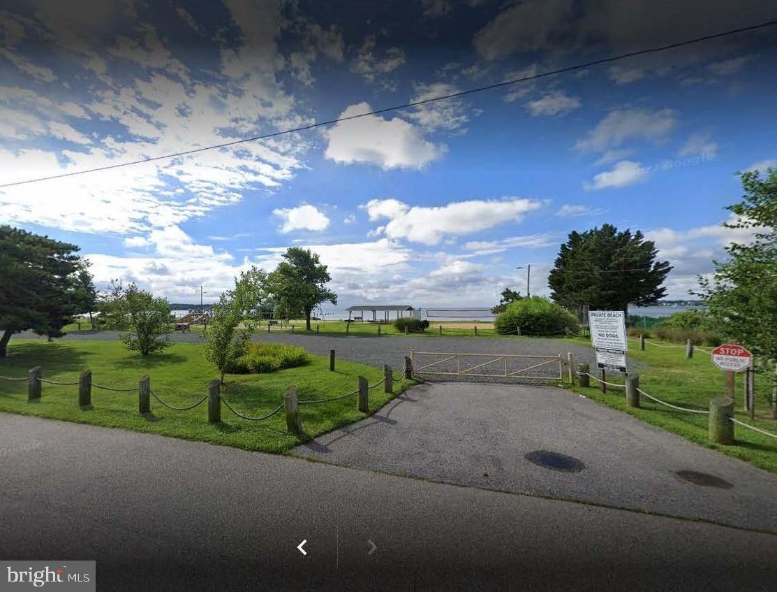 404 Beach Drive Annapolis, MD 21403 - Photo 23 of 25 a view of a street with a yard