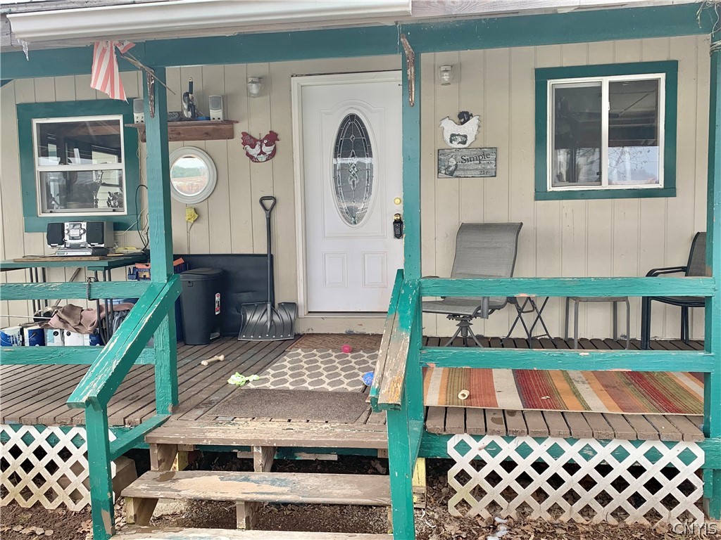 3403 Burke Road Vernon, NY 13477 - Photo 3 of 42 Covered front porch is a popular summer seat.