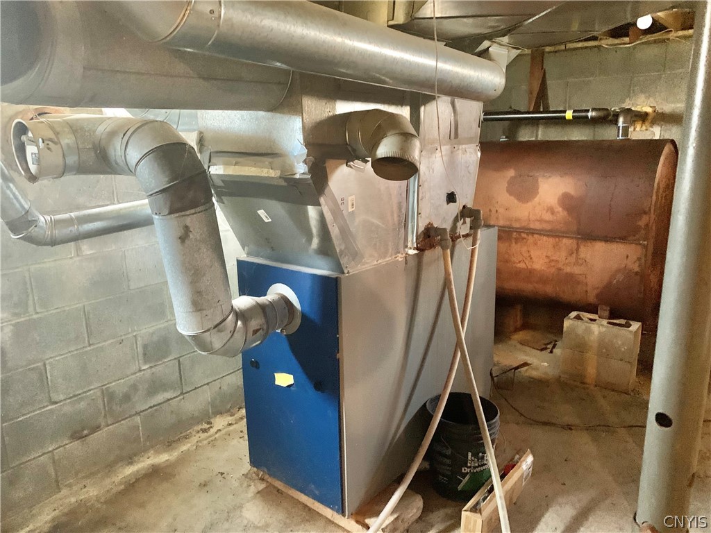 3403 Burke Road Vernon, NY 13477 - Photo 32 of 42 Oil fired furnace and oil tank.