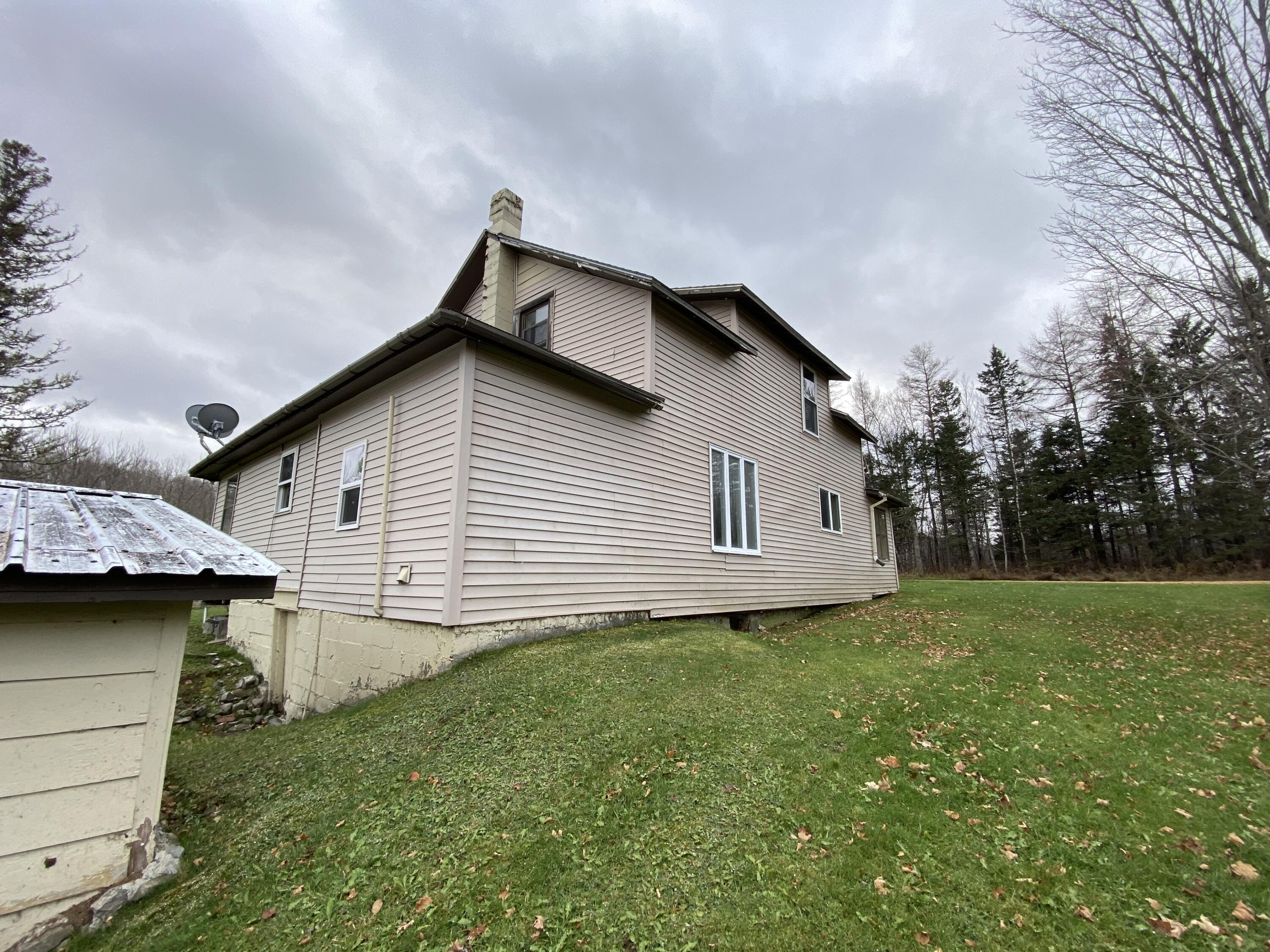 32 Guy Cyr Road Van Buren, ME 04785 - Photo 9 of 37 side view of house