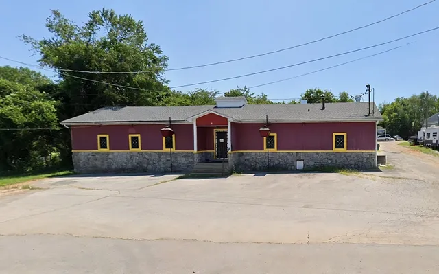 a front view of house with yard