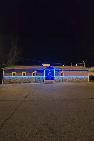 a view of city with tall trees