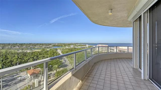 a bathroom with a granite countertop sink a mirror and a shower