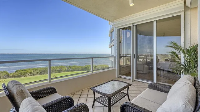 a bathroom with a shower sink and mirror