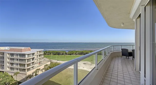 a view of balcony with furniture