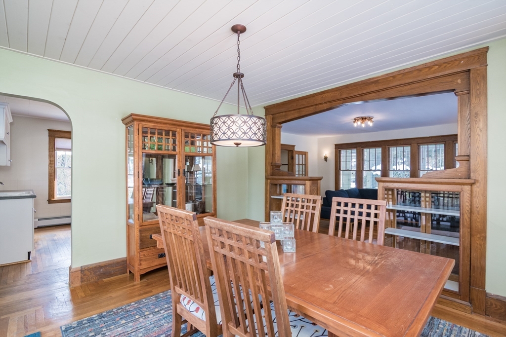 2 Oak Street Easthampton, MA 01027 - Photo 11 of 42 a view of a dining room with furniture window and wooden floor