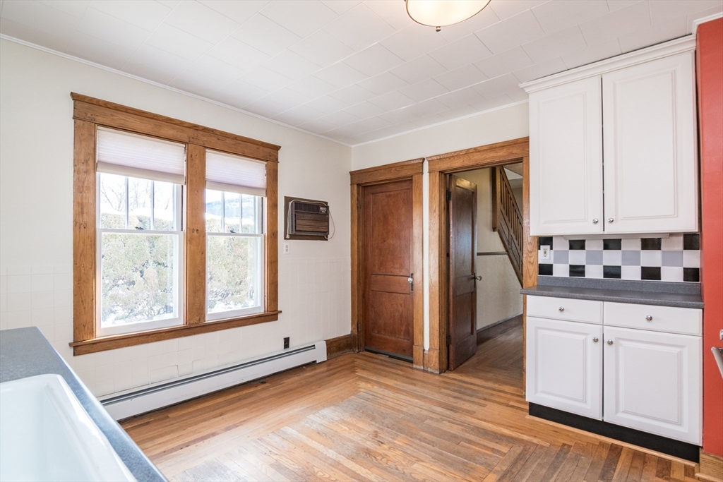 2 Oak Street Easthampton, MA 01027 - Photo 13 of 42 a kitchen with stainless steel appliances granite countertop a refrigerator and cabinets