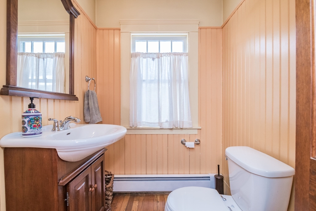 2 Oak Street Easthampton, MA 01027 - Photo 17 of 42 a bathroom with a sink a toilet and tub
