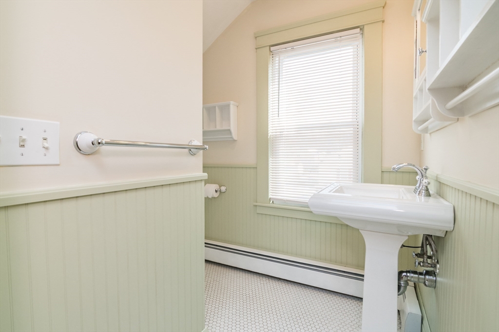 2 Oak Street Easthampton, MA 01027 - Photo 26 of 42 a bathroom with a sink and a bathtub