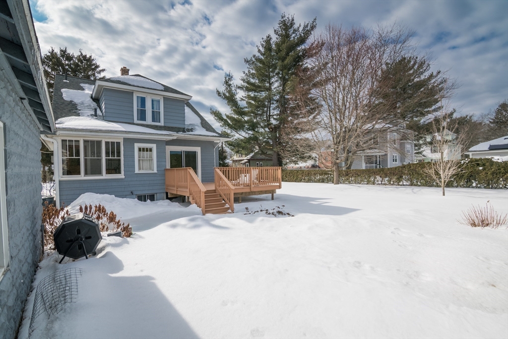2 Oak Street Easthampton, MA 01027 - Photo 31 of 42 a view of a house with a yard covered in snow