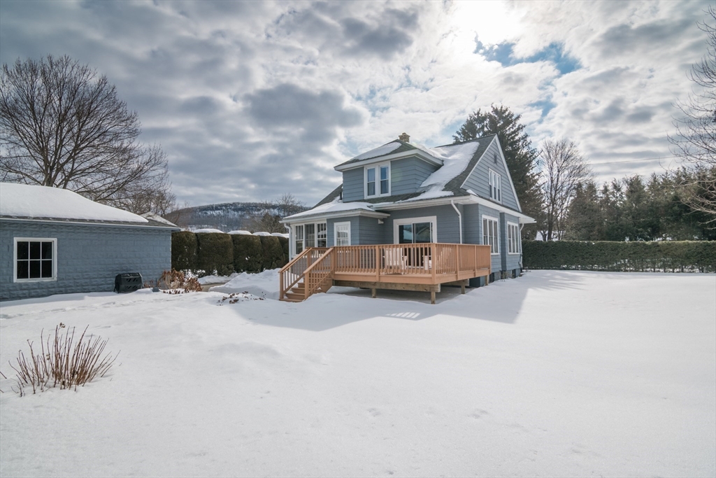 2 Oak Street Easthampton, MA 01027 - Photo 32 of 42 a view of a house with snow in the background