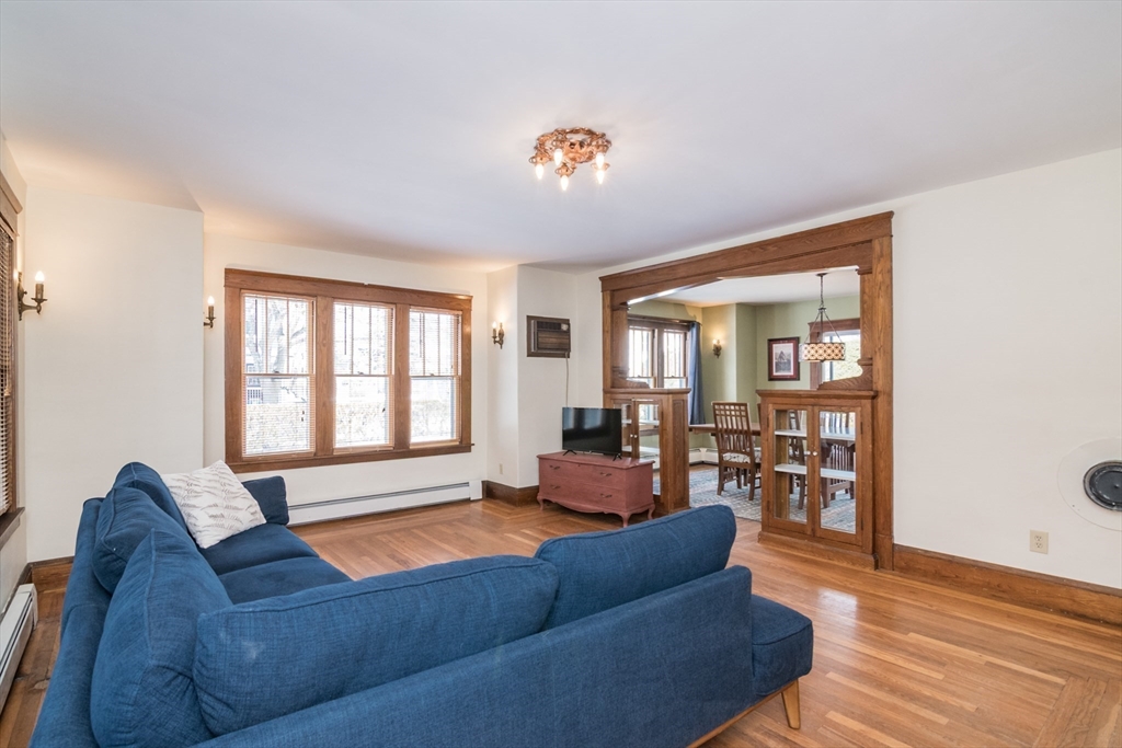 2 Oak Street Easthampton, MA 01027 - Photo 7 of 42 a living room with furniture and a large window