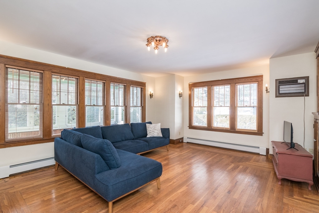 2 Oak Street Easthampton, MA 01027 - Photo 8 of 42 a living room with furniture and a large window