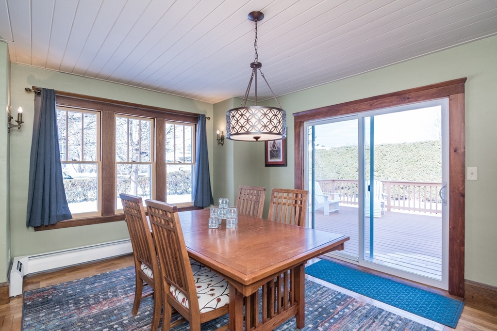 2 Oak Street Easthampton, MA 01027 - Photo 10 of 42 a dining room with furniture a chandelier and wooden floor