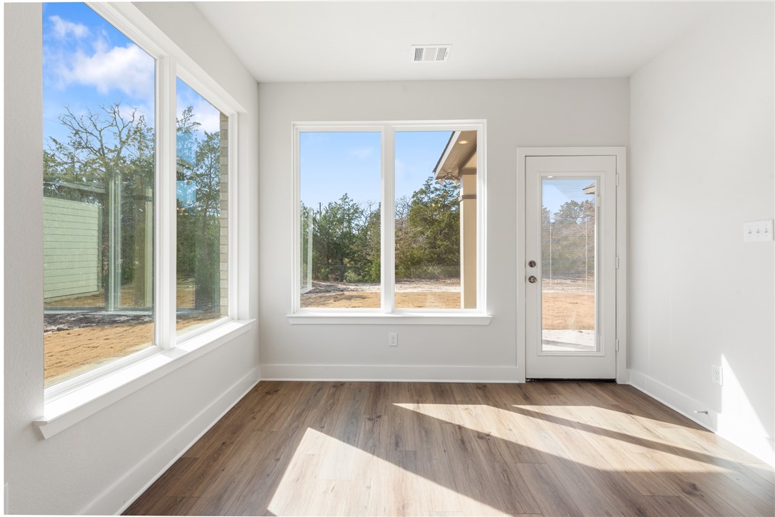 8452 Muir Wood Loop Anderson, TX 77830 - Photo 15 of 48 a view of an empty room with a window