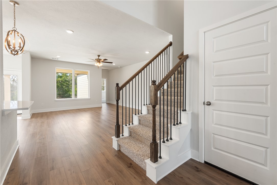 8452 Muir Wood Loop Anderson, TX 77830 - Photo 30 of 48 a view of an entryway with wooden floor