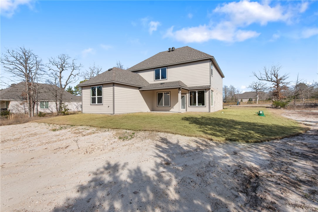 8452 Muir Wood Loop Anderson, TX 77830 - Photo 47 of 48 a view of a house with a yard