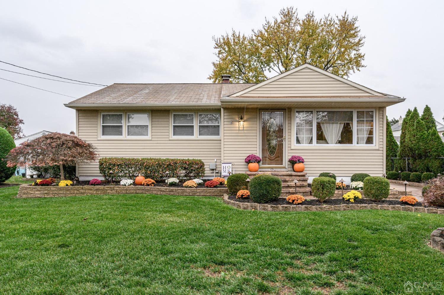 401 Maple Avenue Delanco, NJ 08075 - Photo 1 of 1 a front view of a house with a garden