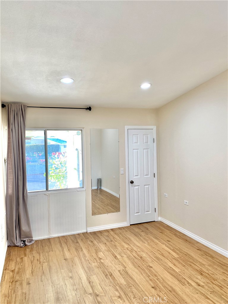 1312 Golden Rain Road Seal Beach, CA 90740 - Photo 17 of 38 main bedroom with window to front porch