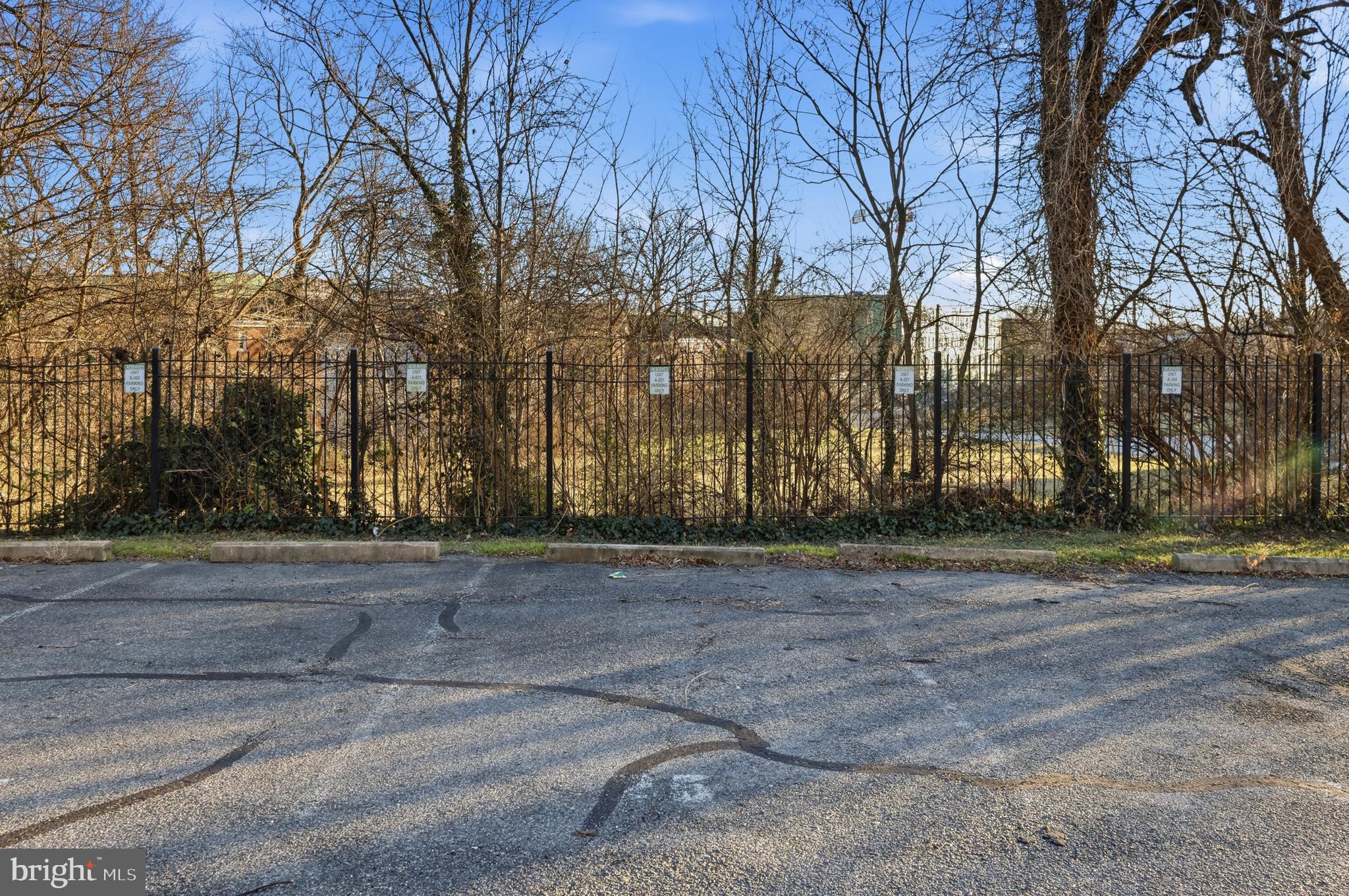 625 Chesapeake Street Southeast, Unit 301 Washington, DC 20032 - Photo 22 of 23 a view of a yard with trees