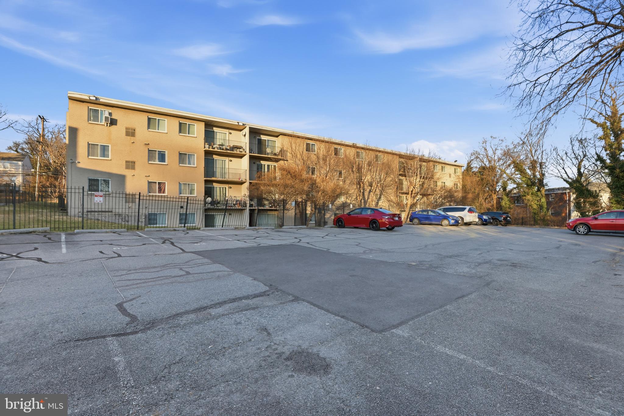 625 Chesapeake Street Southeast, Unit 301 Washington, DC 20032 - Photo 23 of 23 a view of street with parked cars