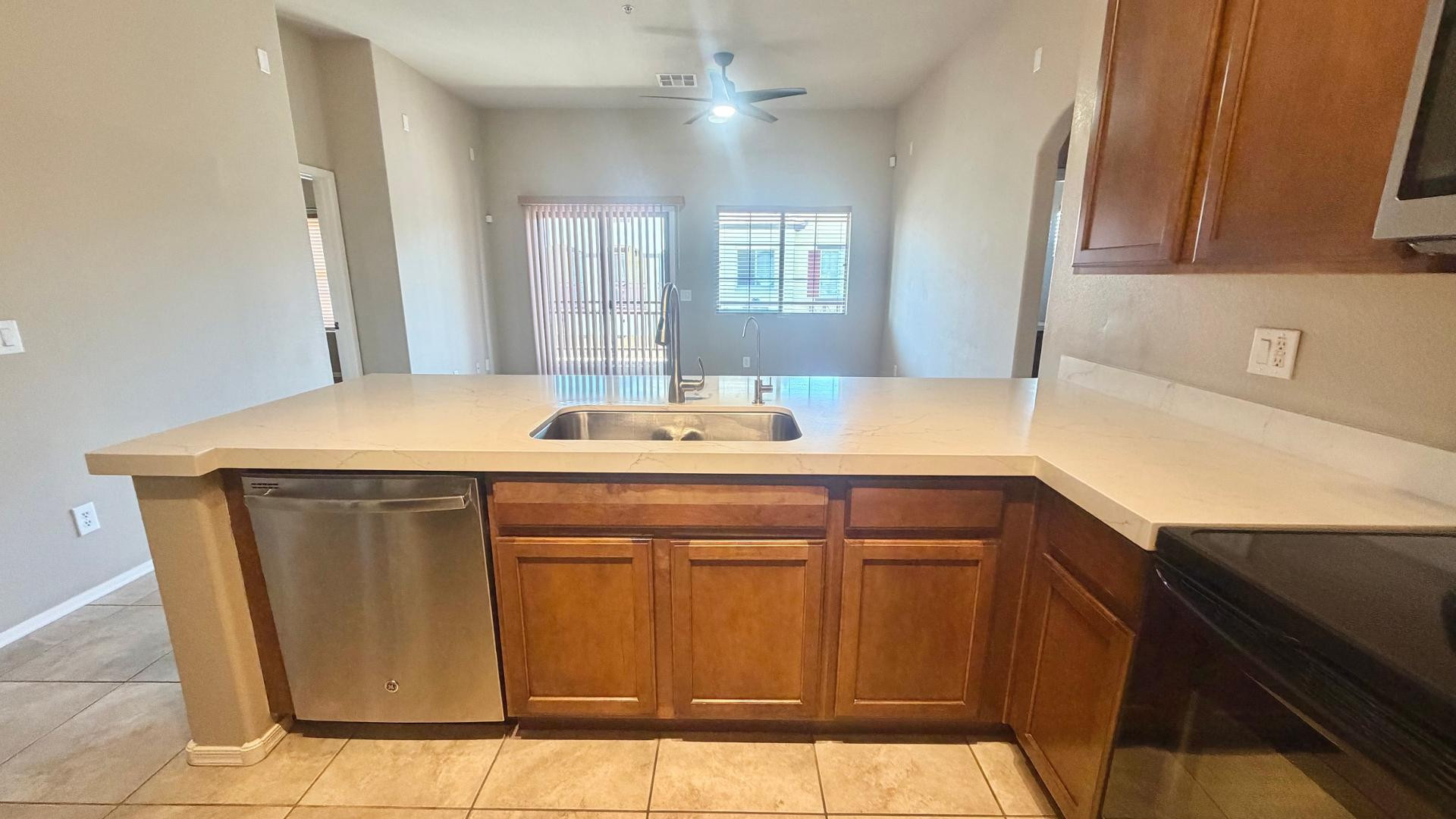 2725 East Mine Creek Road, Unit 2172 Phoenix, AZ 85024 - Photo 7 of 28 a room with a sink cabinets and appliances