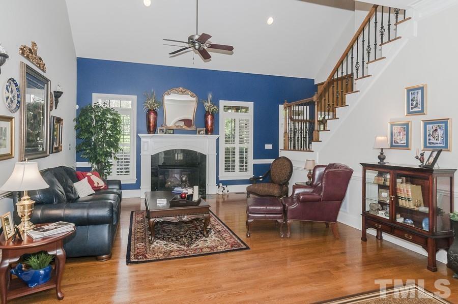 3317 Canoe Brook Parkway Raleigh, NC 27614 - Photo 11 of 67 a living room with furniture and a fireplace
