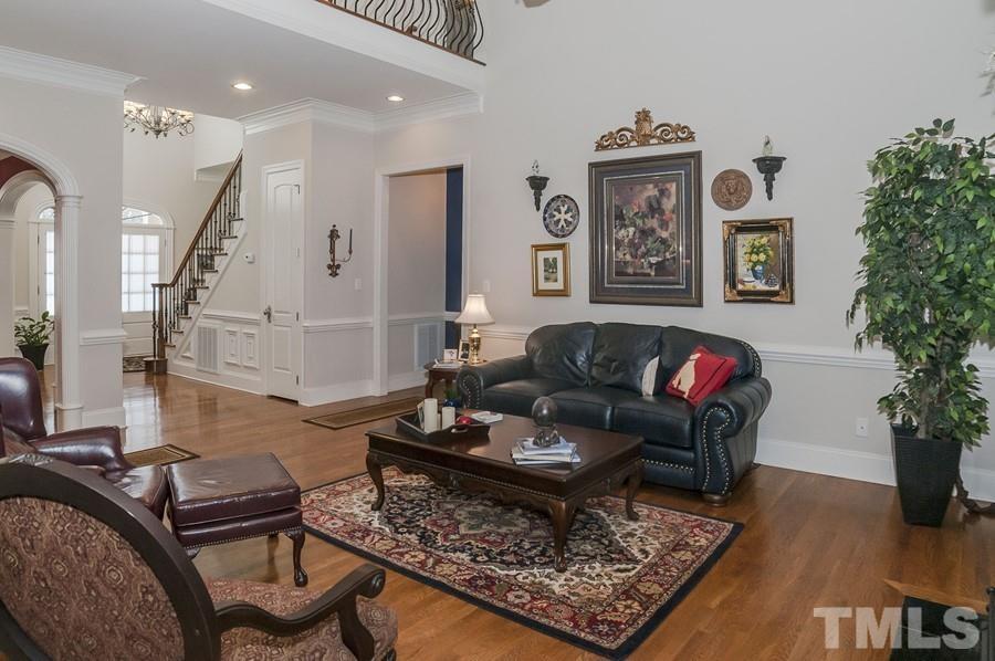 3317 Canoe Brook Parkway Raleigh, NC 27614 - Photo 12 of 67 a living room with furniture and wooden floor