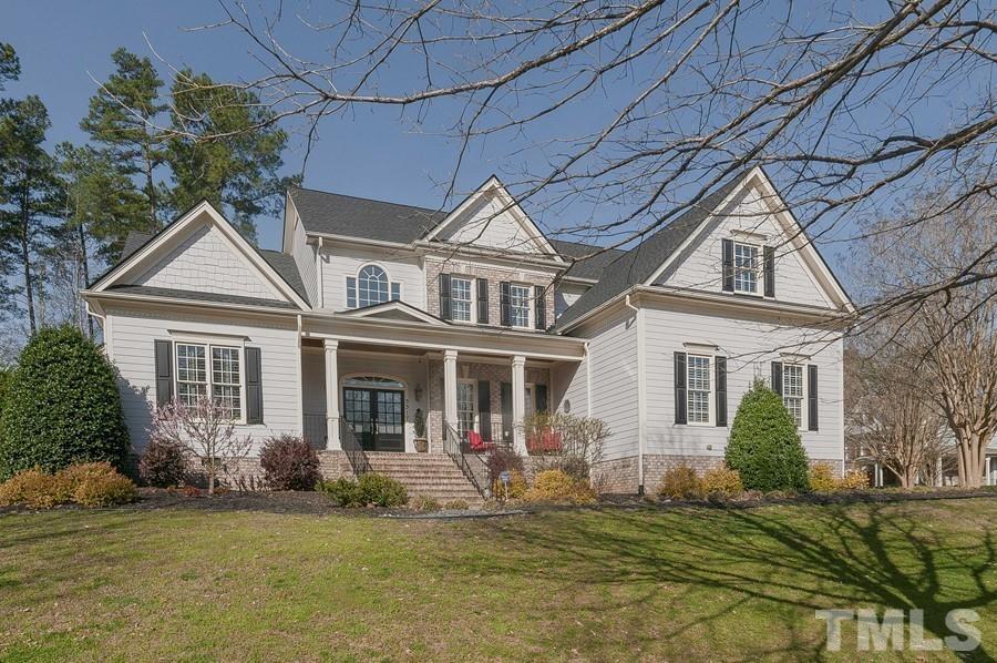 3317 Canoe Brook Parkway Raleigh, NC 27614 - Photo 2 of 67 a front view of a house with a yard
