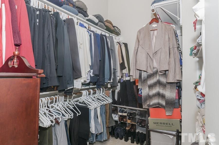 3317 Canoe Brook Parkway Raleigh, NC 27614 - Photo 22 of 67 a view of walk in closet with clothes
