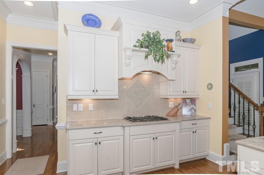 3317 Canoe Brook Parkway Raleigh, NC 27614 - Photo 26 of 67 a bathroom with granite countertop a sink and a vanity