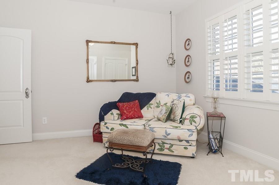 3317 Canoe Brook Parkway Raleigh, NC 27614 - Photo 47 of 67 a living room with furniture and a window
