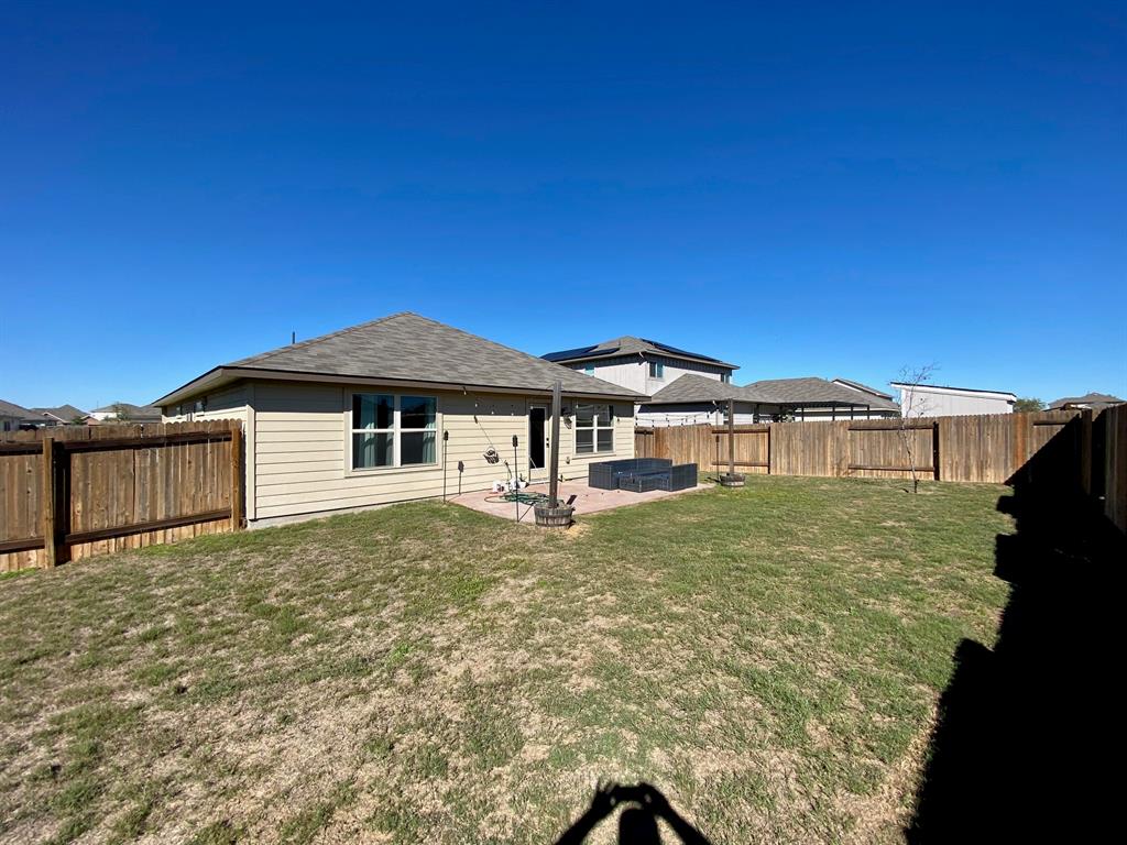 149 Red Sun Drive Kyle, TX 78640 - Photo 18 of 18 a front view of a house with garden