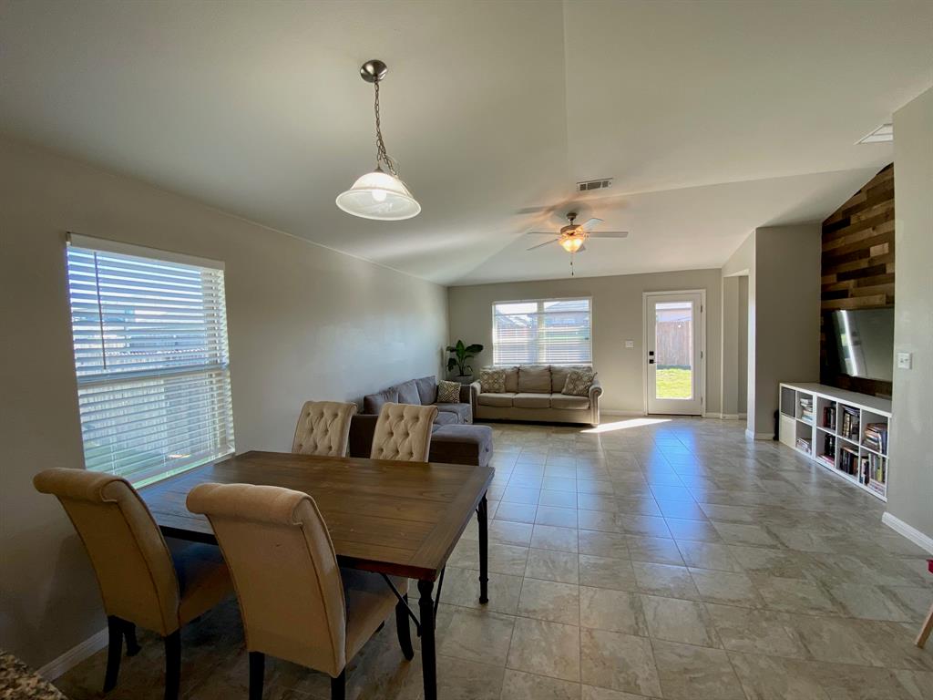 149 Red Sun Drive Kyle, TX 78640 - Photo 6 of 18 a view of a livingroom with furniture window and wooden floor