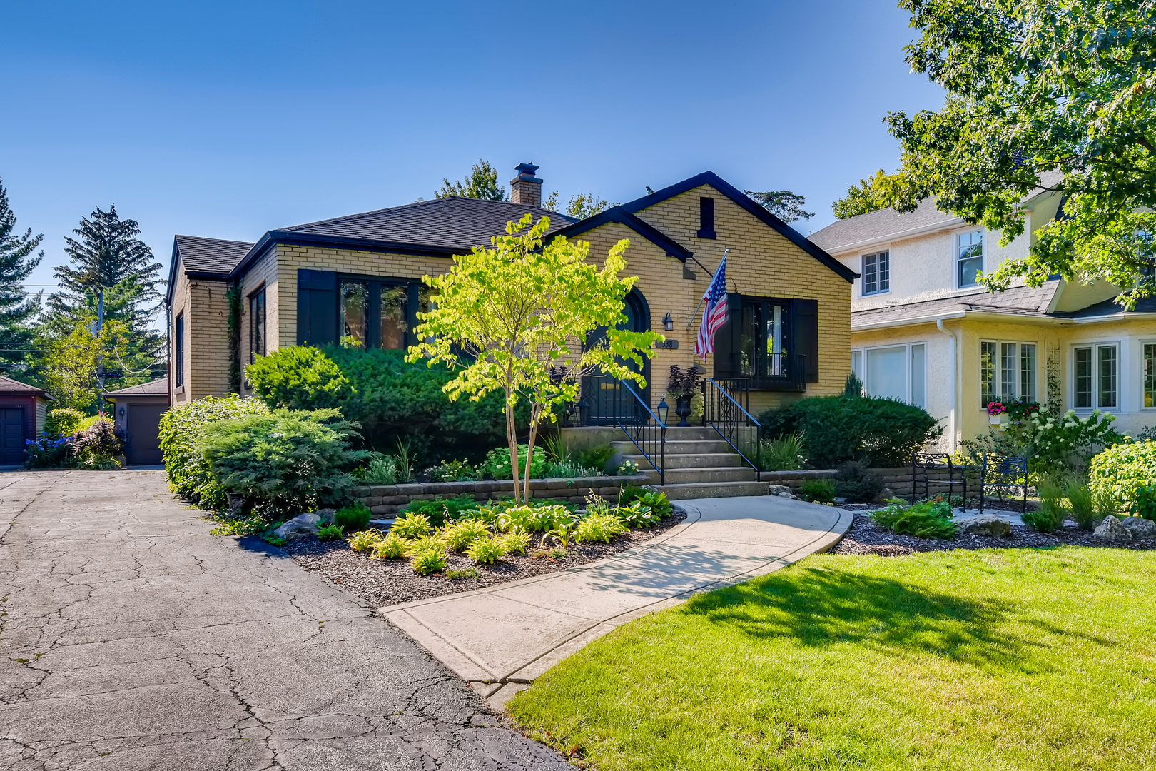338 Northwood Road Riverside, IL 60546 - Photo 2 of 30 a front view of house with yard and outdoor seating