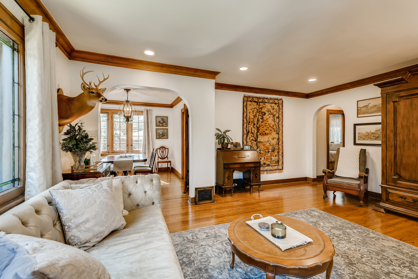 338 Northwood Road Riverside, IL 60546 - Photo 7 of 30 a living room with furniture and a fireplace