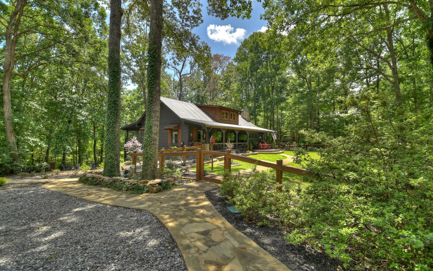 31 Redbird Trail Blue Ridge, GA 30513 - Photo 23 of 70 a backyard of a house with table and chairs