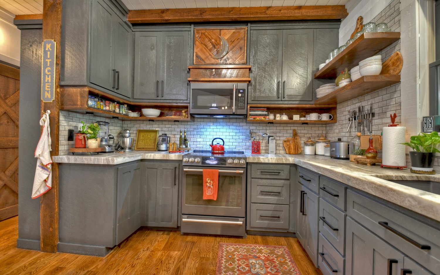 31 Redbird Trail Blue Ridge, GA 30513 - Photo 40 of 70 a kitchen with stainless steel appliances granite countertop a stove and cabinets