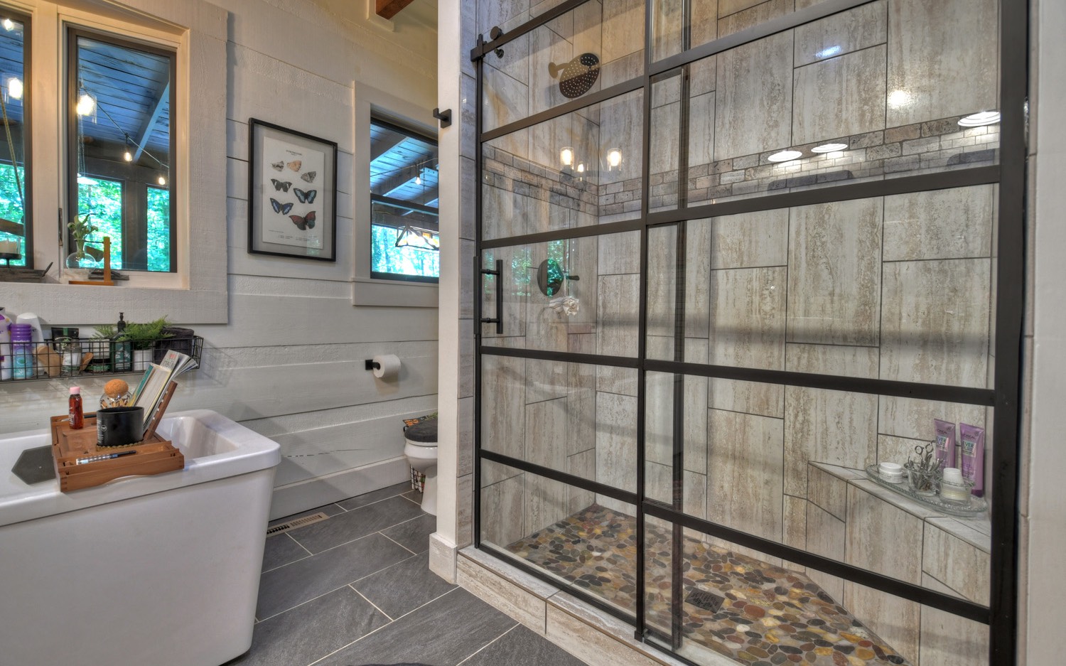 31 Redbird Trail Blue Ridge, GA 30513 - Photo 7 of 70 a bathroom with a tub a mirror and shower