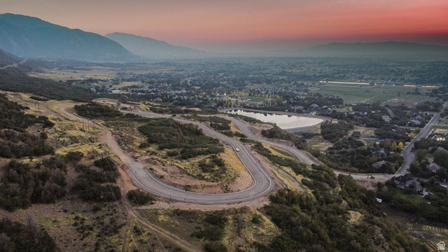 145 South Troy Street, Unit 13 Mapleton, UT 84664 - Photo 8 of 12 Aerial view at dusk of a water and mountain view