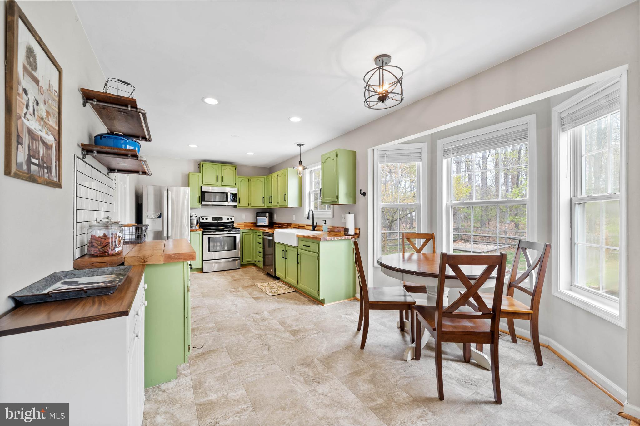 110 Winfield Drive Elkton, MD 21921 - Photo 26 of 50 a view of a dining room with furniture and a large window