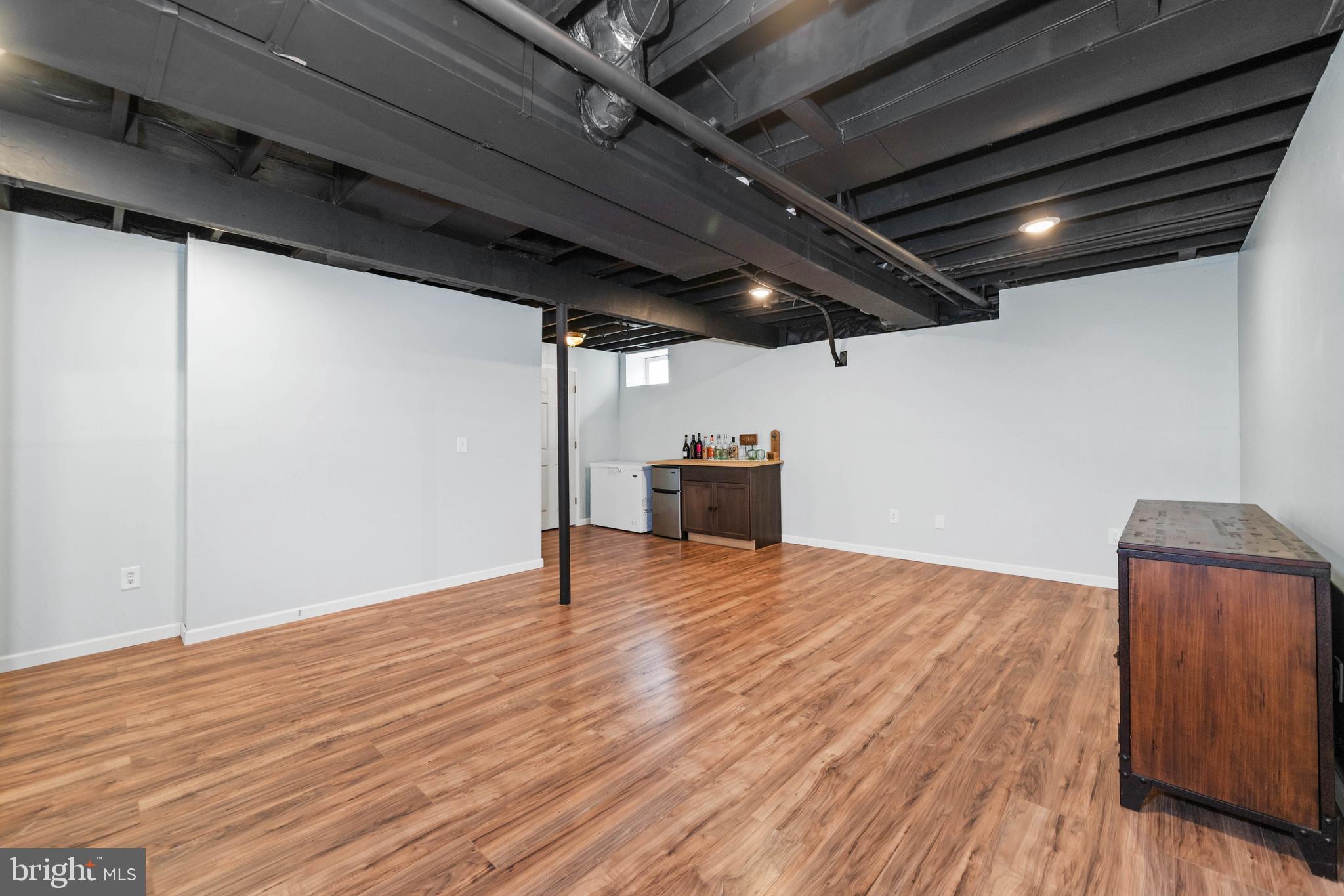 110 Winfield Drive Elkton, MD 21921 - Photo 42 of 50 a view of an empty room with wooden floor