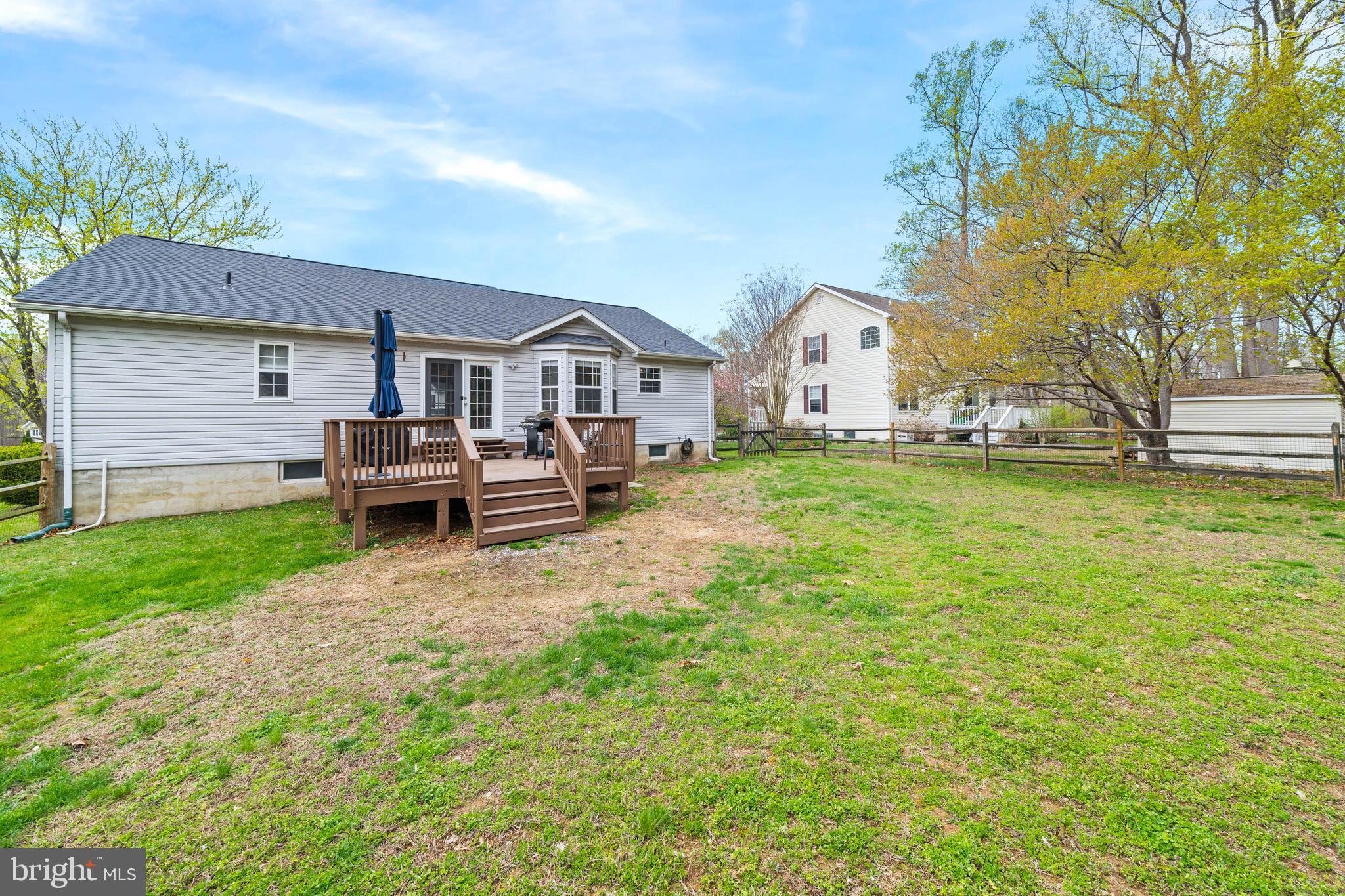110 Winfield Drive Elkton, MD 21921 - Photo 7 of 50 a view of a house with a big yard and large trees