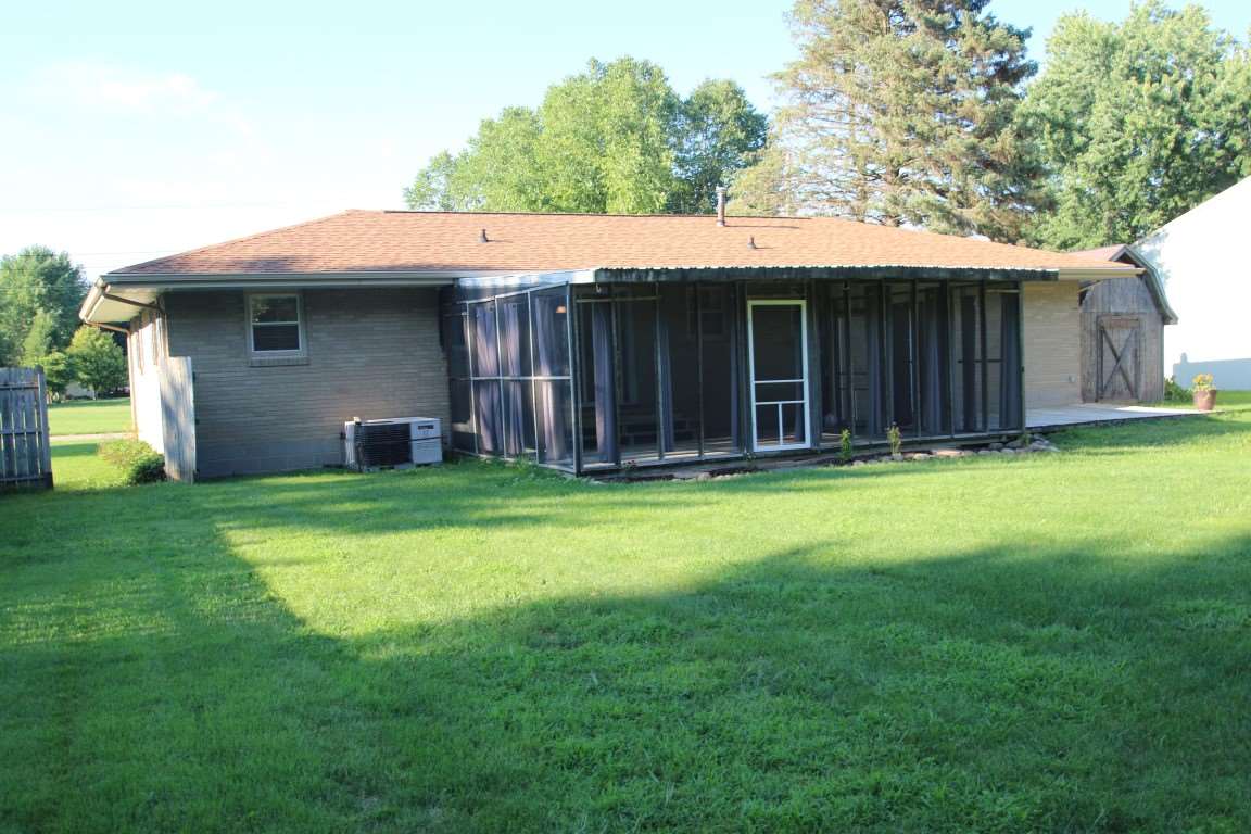 450 North Appleton Road Belvidere, IL 61008 - Photo 18 of 22 a view of a house with a backyard